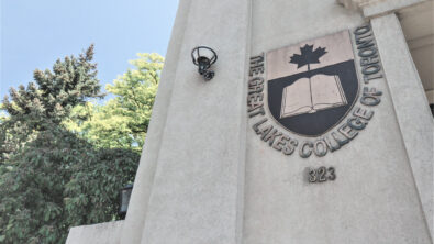 School logo sign at private high school in Toronto entrance