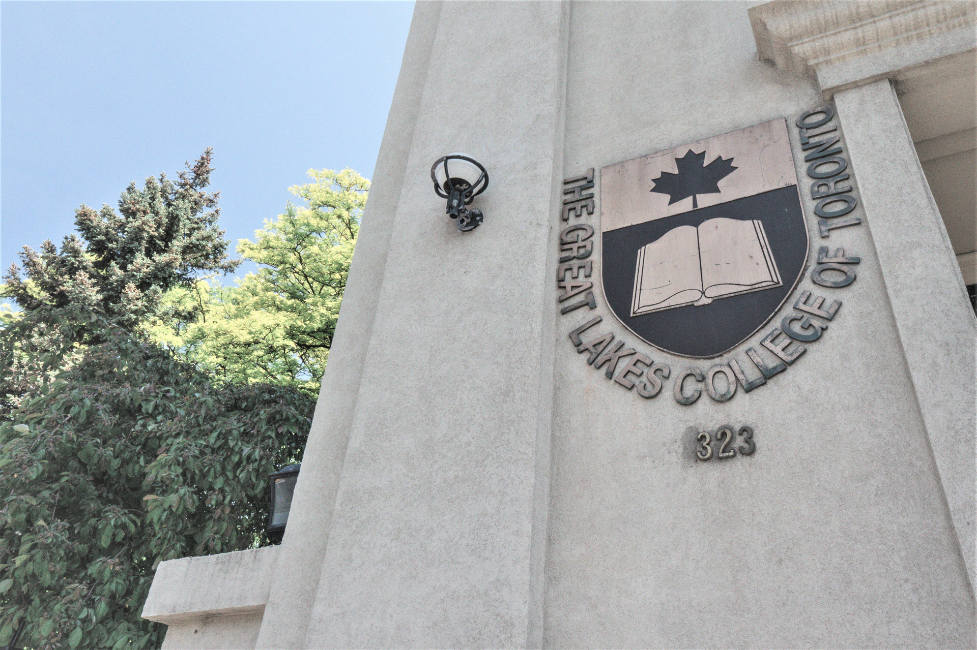 school-front School logo sign at private high school in Toronto entrance