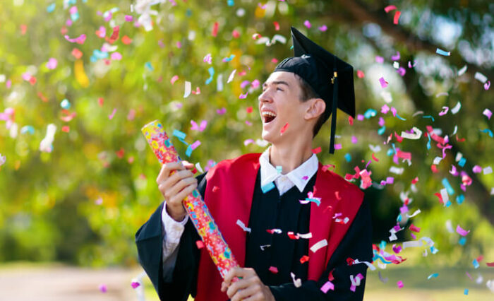 Private school graduate celebrating