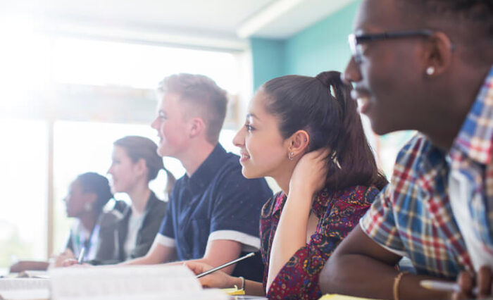 students in fast track university prep school having a group discussion