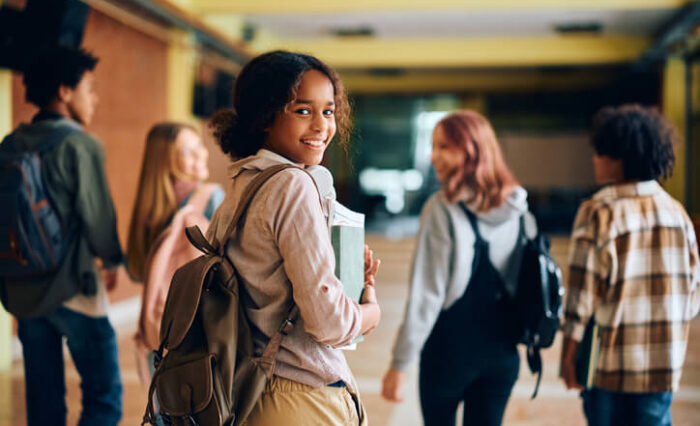 fast track university prep school A smiling female student in our private school