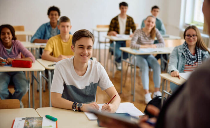 private school in Toronto A class of private school students sitting at desks in class