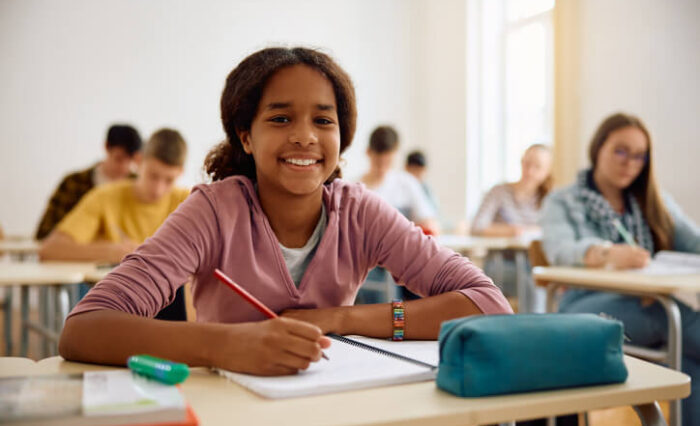 fast track university prep school A smiling female student at our private school in Toronto