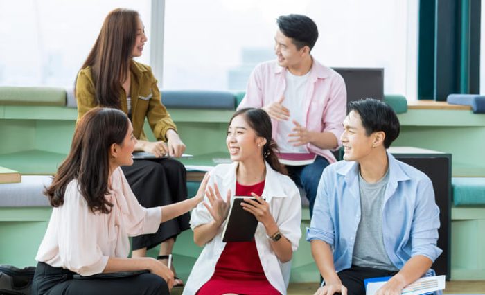 esl program A group of students attending ESL school having a lively discussion