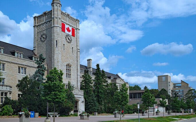 private school A university building with a Canadian flag on it., representing those who attend private school